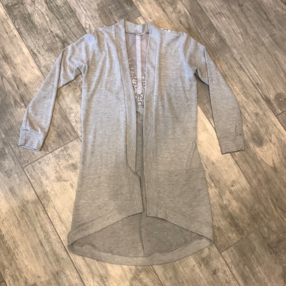 Francesca’s Long lace back cardigan. Soft poly/rayon/spandex